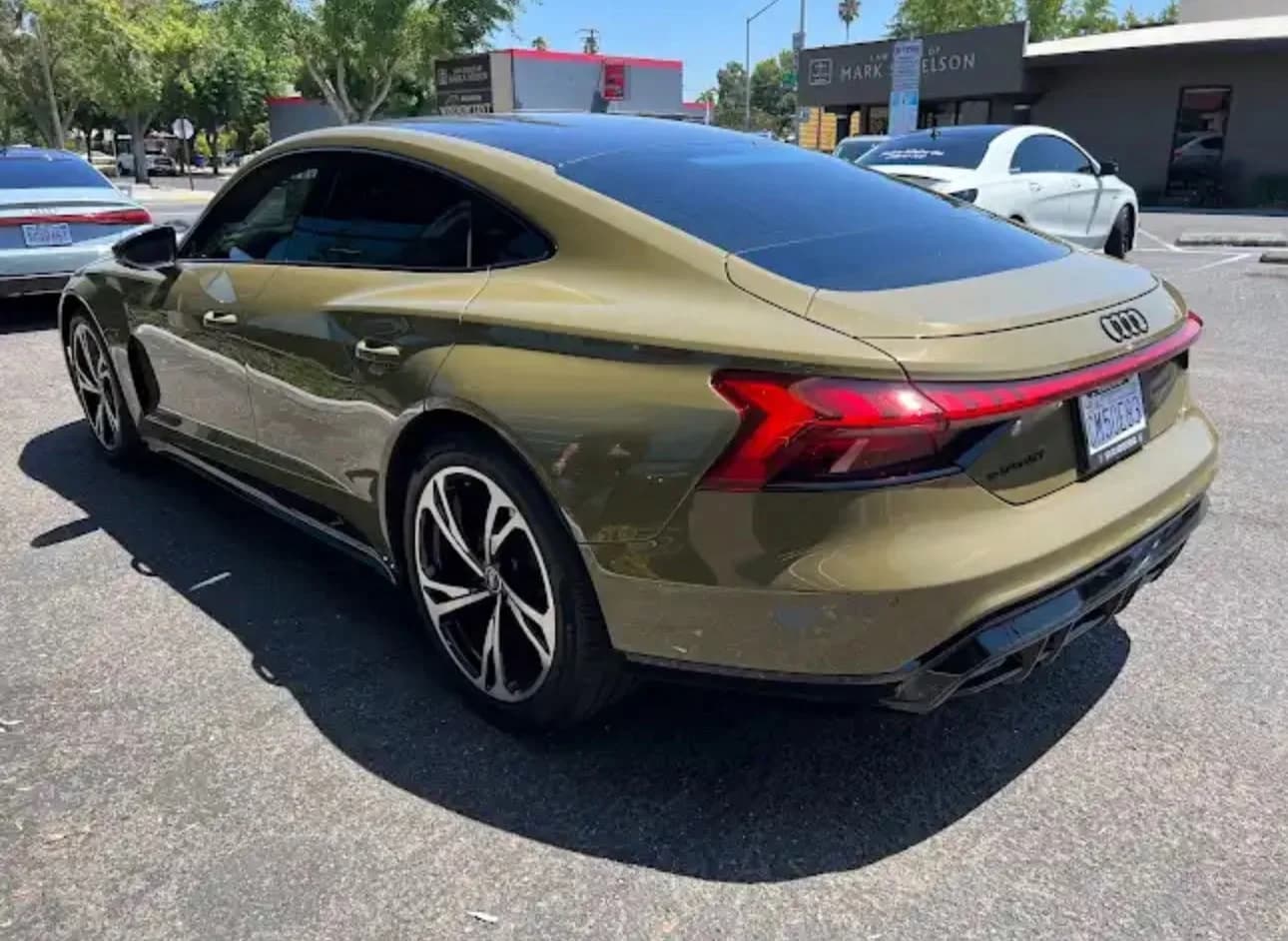 Gold Audi e-tron GT with professional ceramic window tinting