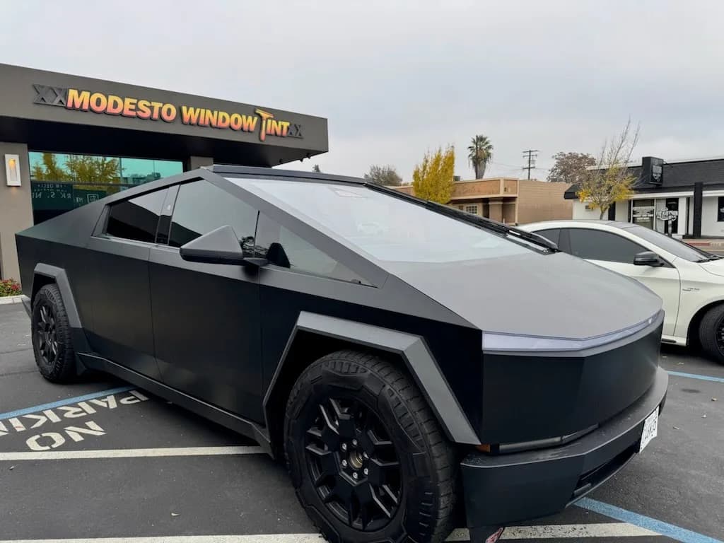 Black Tesla Cybertruck with complete window tinting coverage