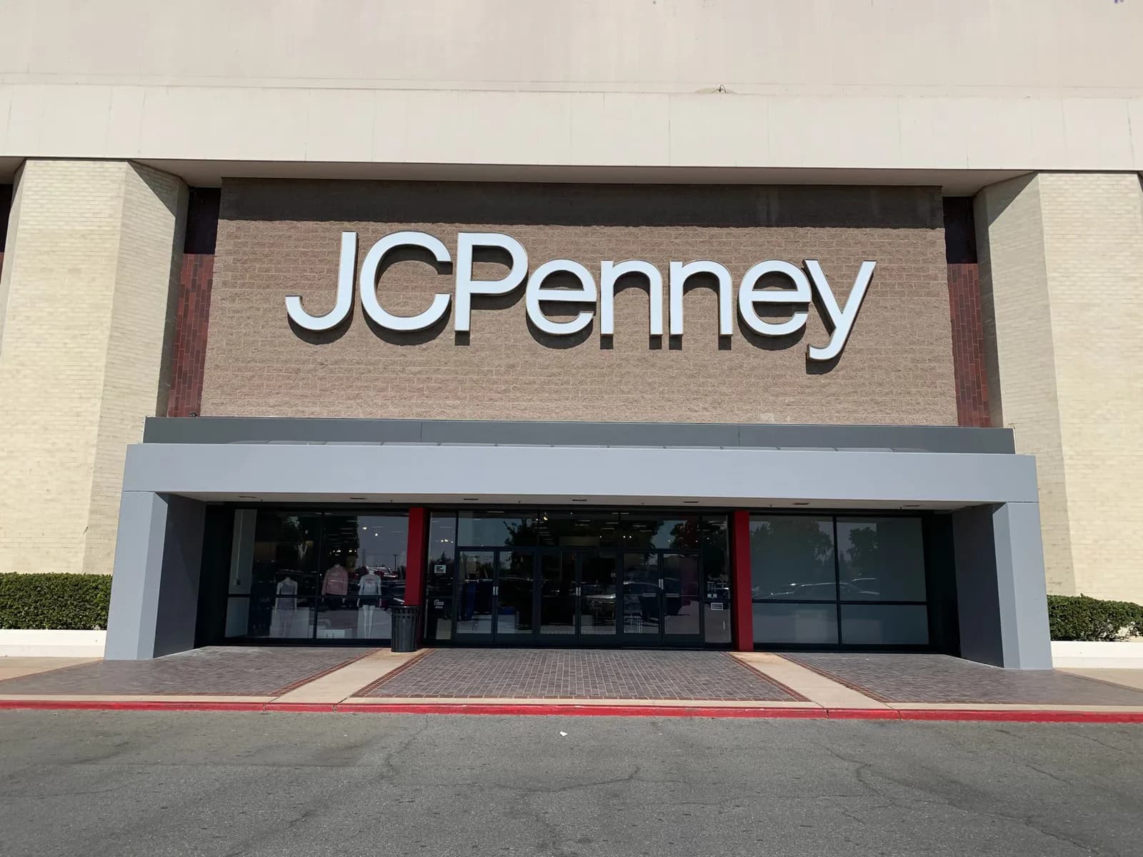 JCPenney storefront in Modesto with frosted privacy window film on the entrance glazing